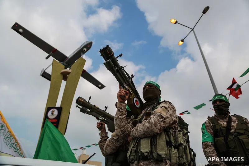 Members of the Ezzedine al-Qassam Brigades, the military wing of the Palestinian Islamist movement Hamas, attend a memorial in Rafah in the southern Gaza Strip on January 31, 2017, for Mohamed Zouari, a 49-year-old Tunis...