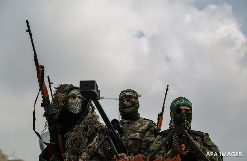 Members of the Ezzedine al-Qassam Brigades, the military wing of the Palestinian Islamist movement Hamas, attend a memorial in Rafah in the southern Gaza Strip on January 31, 2017, for Mohamed Zouari, a 49-year-old Tunis...