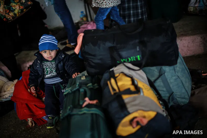 Palestinians wait for travel permits to cross into Egypt through the Rafah border crossing after it was opened by Egyptian authorities for humanitarian cases, in Rafah in the southern Gaza Strip, on January 31, 2017. Pho...