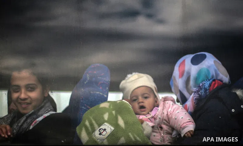 Palestinians wait for travel permits to cross into Egypt through the Rafah border crossing after it was opened by Egyptian authorities for humanitarian cases, in Rafah in the southern Gaza Strip, on January 31, 2017. Pho...
