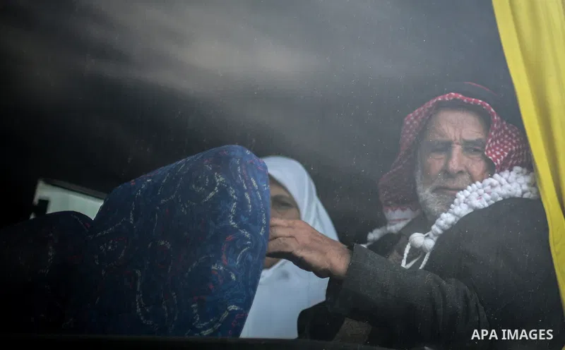 Palestinians wait for travel permits to cross into Egypt through the Rafah border crossing after it was opened by Egyptian authorities for humanitarian cases, in Rafah in the southern Gaza Strip, on January 31, 2017. Pho...