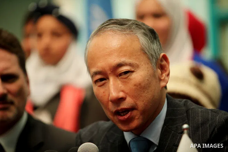 Japanese Ambassador to Palestine, Takeshi Okubo speaks during a joint press conference with Commissioner-General of the UN Relief and Works Agency (UNRWA) Pierre Krahenbuhl, at the headquarters United Nations Relief and...