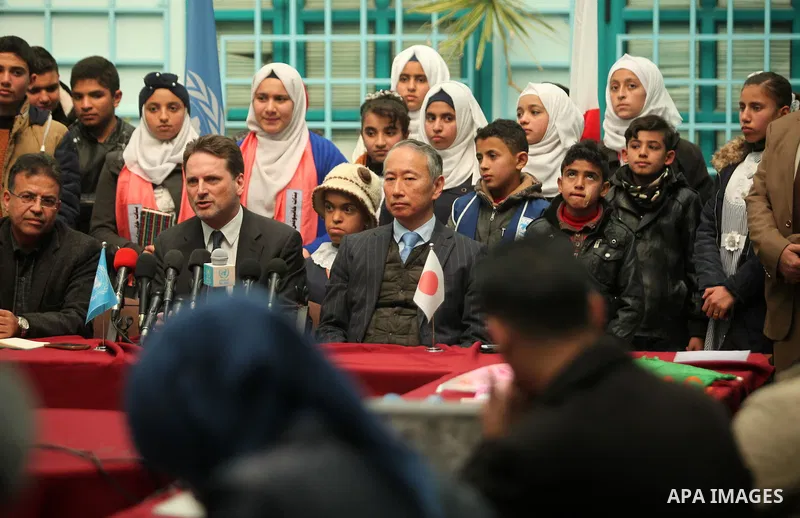 Japanese Ambassador to Palestine, Takeshi Okubo, and Commissioner-General of the UN Relief and Works Agency (UNRWA) Pierre Krahenbuhl, attend a joint press conference at the headquarters United Nations Relief and Works A...