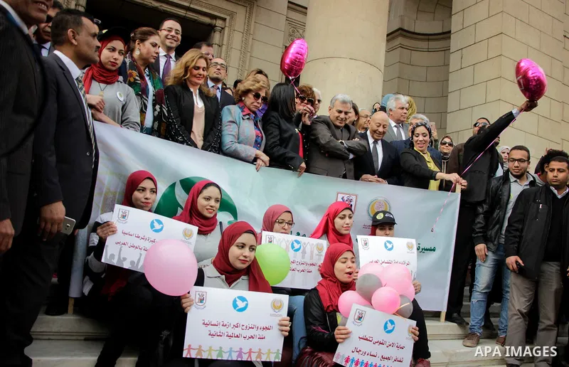 Egyptian women hold placards during a protest to show solidarity with displaced women in Arab countries, at Cairo University, marking the Arab women's day in the Egyptian capital Cairo on Feb. 01, 2017. Photo by Amr Saye...