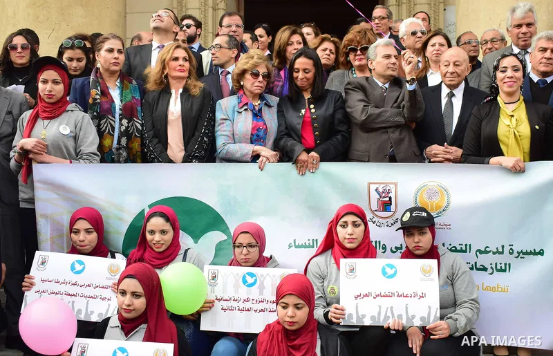 Egyptian women hold placards during a protest to show solidarity with displaced women in Arab countries, at Cairo University, marking the Arab women's day in the Egyptian capital Cairo on Feb. 01, 2017. Photo by Amr Saye...