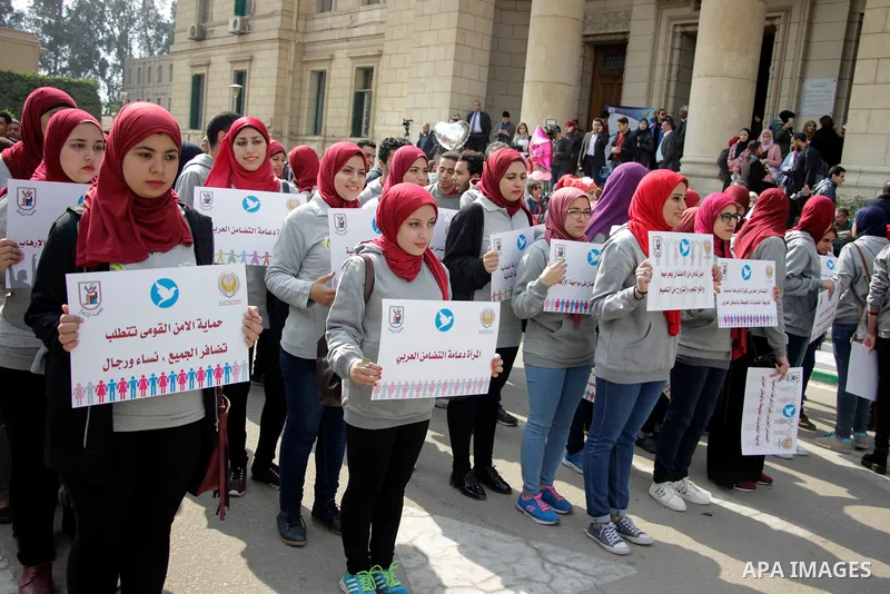 Egyptian women hold placards during a protest to show solidarity with displaced women in Arab countries, at Cairo University, marking the Arab women's day in the Egyptian capital Cairo on Feb. 01, 2017. Photo by Amr Saye...