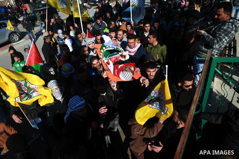Mourners carry the body of Mohammad Zeidan, 16, a PMourners carry the body of Mohammad Zeidan, 16, a Palestinian youth who was killed by Israeli security forces on Nov. 25 after allegedly attempting to carry out a stabbi...