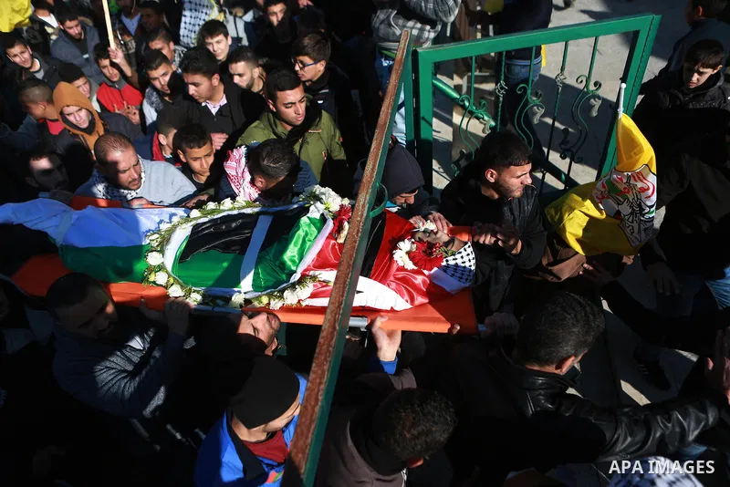 Mourners carry the body of Mohammad Zeidan, 16, a PMourners carry the body of Mohammad Zeidan, 16, a Palestinian youth who was killed by Israeli security forces on Nov. 25 after allegedly attempting to carry out a stabbi...
