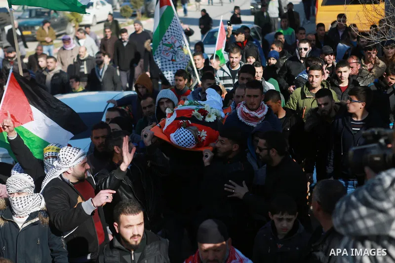 Mourners carry the body of Mohammad Zeidan, 16, a PMourners carry the body of Mohammad Zeidan, 16, a Palestinian youth who was killed by Israeli security forces on Nov. 25 after allegedly attempting to carry out a stabbi...
