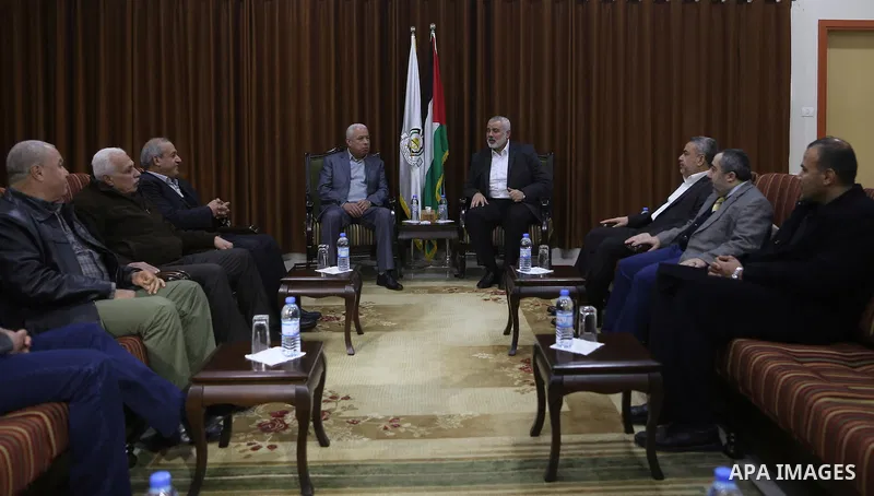 Hamas leader Ismail Haniyeh, meets with leader of the Democratic Front for the Liberation of Palestine (DFLP) Kayed al-Ghoul, in Gaza city, on February 5, 2017. Photo by Ashraf Amra