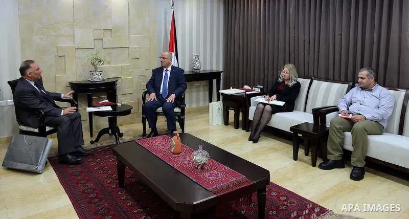 Palestinian Prime Minister, Rami Hamdallah, meets with The new Turkish Consul at the Palestine Kurgan Turkoglu, in the West Bank city of Ramallah, on February 5, 2017. Photo by Prime Minister Office