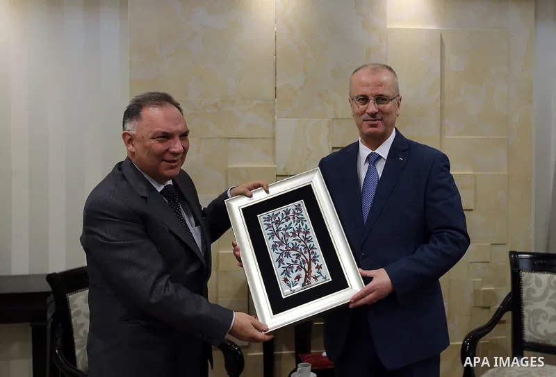 Palestinian Prime Minister, Rami Hamdallah, meets with The new Turkish Consul at the Palestine Kurgan Turkoglu, in the West Bank city of Ramallah, on February 5, 2017. Photo by Prime Minister Office