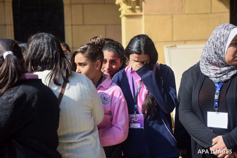 Egyptian Christians mourn during the funeral of Demiana Amir, 14, who was died last night after she was wounded at a bomb explosion that targeted the Saint Peter and Saint Paul Coptic Orthodox Church in December 2016 in...