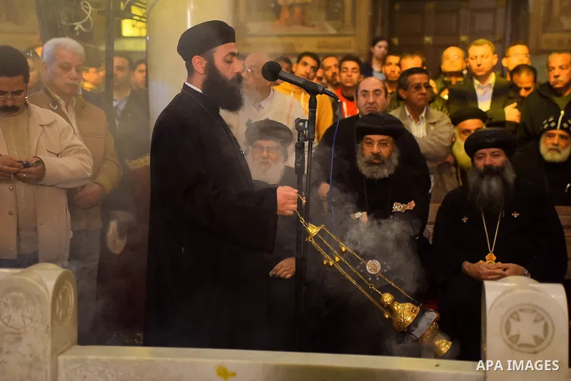 Egyptian Christians mourn during the funeral of Demiana Amir, 14, who was died last night after she was wounded at a bomb explosion that targeted the Saint Peter and Saint Paul Coptic Orthodox Church in December 2016 in...
