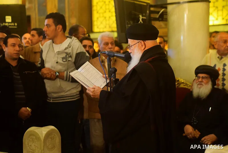Egyptian Christians mourn during the funeral of Demiana Amir, 14, who was died last night after she was wounded at a bomb explosion that targeted the Saint Peter and Saint Paul Coptic Orthodox Church in December 2016 in...