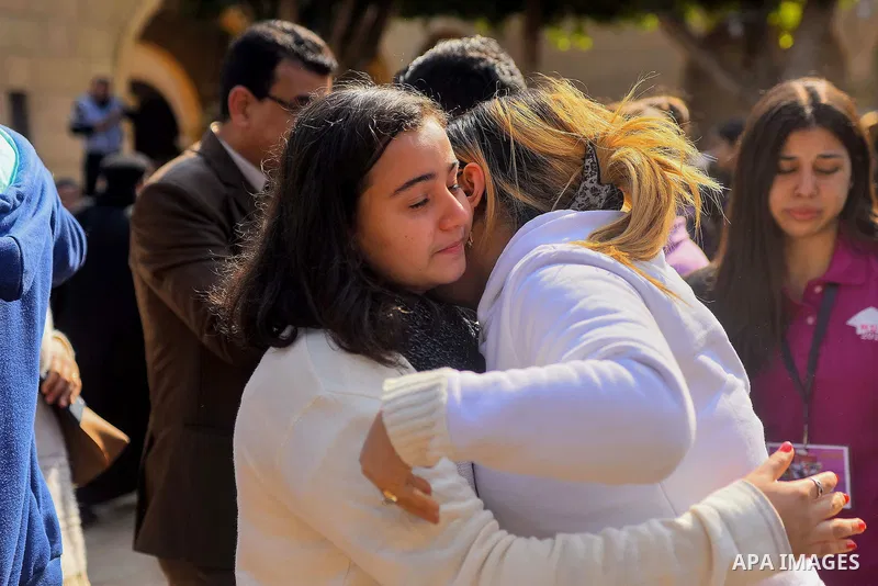 Egyptian Christians mourn during the funeral of Demiana Amir, 14, who was died last night after she was wounded at a bomb explosion that targeted the Saint Peter and Saint Paul Coptic Orthodox Church in December 2016 in...