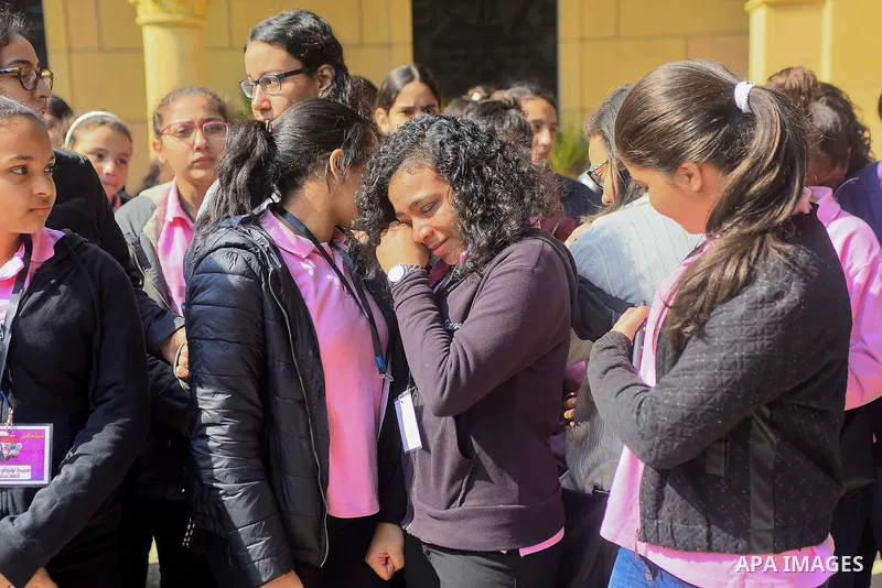 Egyptian Christians mourn during the funeral of Demiana Amir, 14, who was died last night after she was wounded at a bomb explosion that targeted the Saint Peter and Saint Paul Coptic Orthodox Church in December 2016 in...