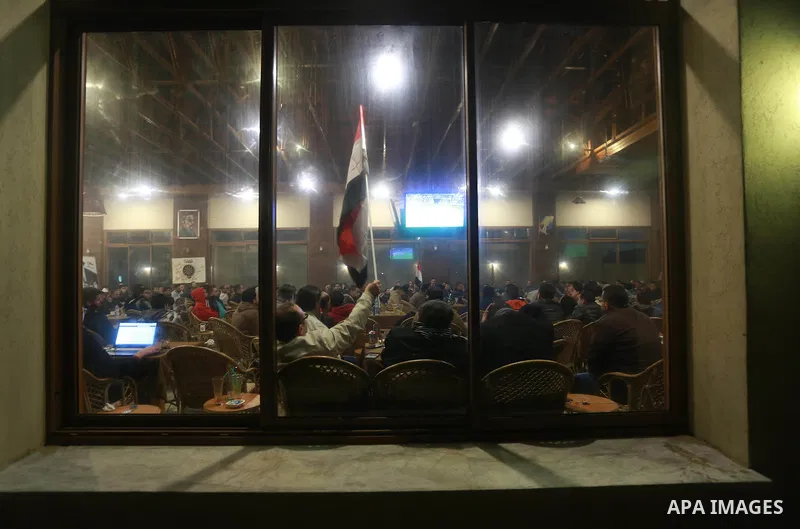 Palestinians watch on a large screen the final match of African Cup of Nations between Egypt and Cameroon, in Gaza City February 5, 2017. Photo by Mohammed Asad
