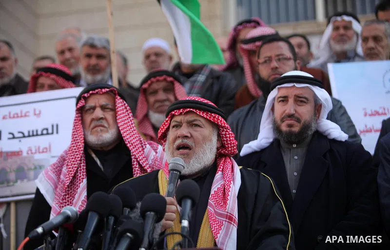 Members of the Palestine Scholars Association take part in a protest against United Nations Secretary-General Antonio Guterres comments about jerusalem, in Gaza city, on February 6, 2017. Photo by Ashraf Amra