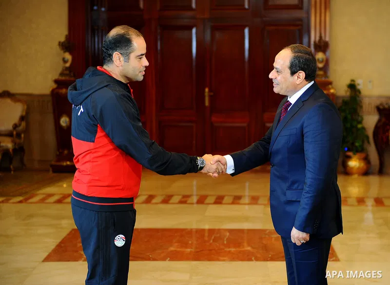 Egyptian President Abdel Fattah al-Sisi meets with Egyptian national football team upon their arrival at Cairo international airport after their participation in Africa Cup of Nations (CAN) which held in Gabon, in Cairo,...