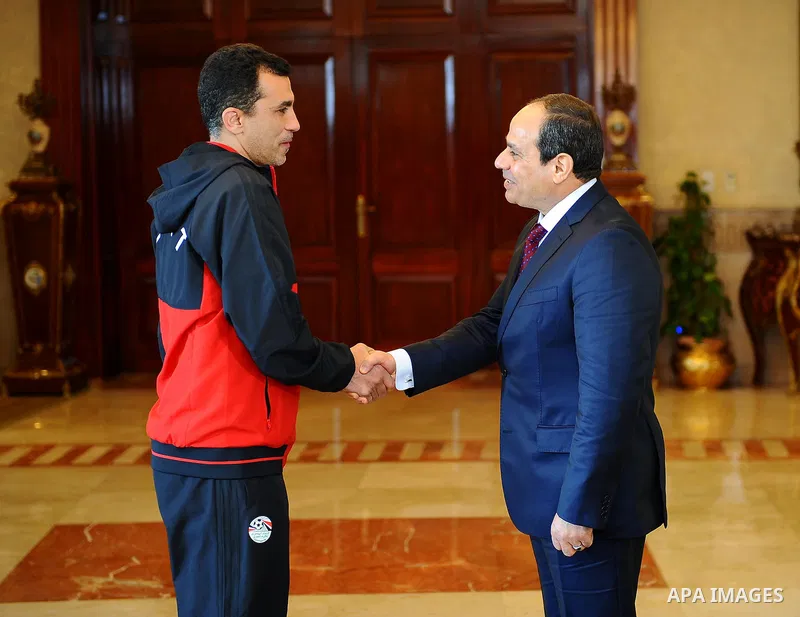 Egyptian President Abdel Fattah al-Sisi meets with Egyptian national football team upon their arrival at Cairo international airport after their participation in Africa Cup of Nations (CAN) which held in Gabon, in Cairo,...