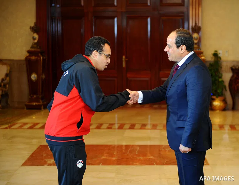 Egyptian President Abdel Fattah al-Sisi meets with Egyptian national football team upon their arrival at Cairo international airport after their participation in Africa Cup of Nations (CAN) which held in Gabon, in Cairo,...