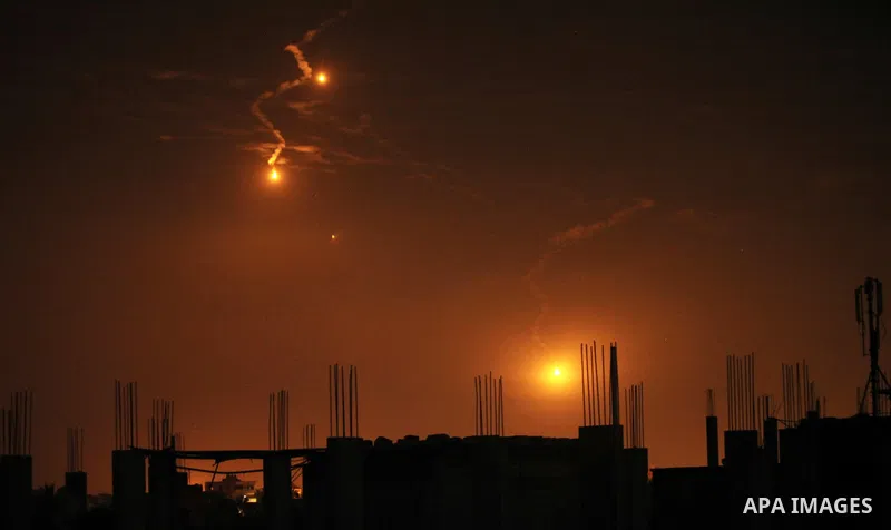 Flares fired by Israeli forces to check the border are seen over Gaza City on February 6, 2017. Israel struck a number of Hamas positions in Gaza after a "projectile" fired from the Palestinian enclave crashed in a borde...