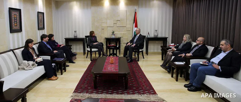 Palestinian Prime Minister Rami Hamdallah, meets with head of the new USAID delegation in Palestine Monica Olsen, in the West Bank city of Ramallah, on February 8, 2017. Photo by Prime Minister Office
