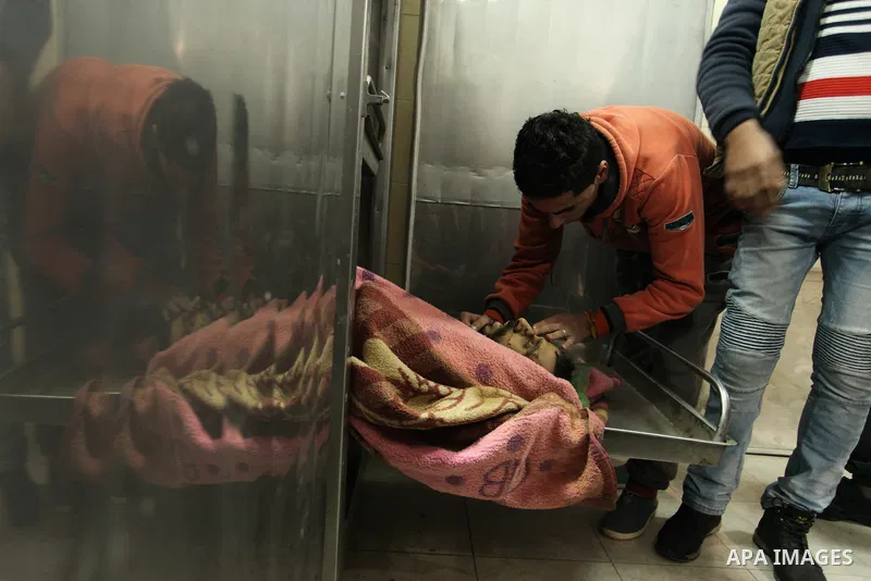 A Relative of one of the two Palestinians, who were killed in a bombing of a tunnel near the Egyptian border, mourn over his body at a morgue in hospital in Rafah in the southern Gaza Strip February 9, 2017. Photo by Ash...