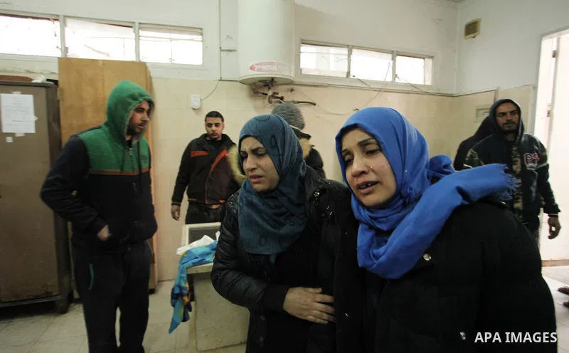 Relatives of one of the two Palestinians, who were killed in a bombing of a tunnel near the Egyptian border, react at a hospital in Rafah in the southern Gaza Strip February 9, 2017. Photo by Ashraf Amra