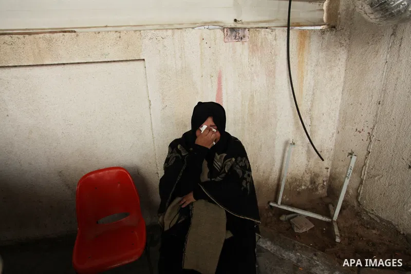 The sister of one of the two Palestinians, who were killed in a bombing of a tunnel near the Egyptian border, mourns at a hospital in Rafah in the southern Gaza Strip February 9, 2017. Photo by Ashraf Amra