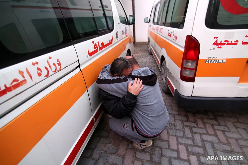 Relatives of one of the two Palestinians, who were killed in a bombing of a tunnel near the Egyptian border, mourn at a hospital in Rafah in the southern Gaza Strip February 9, 2017. Photo by Ashraf Amra