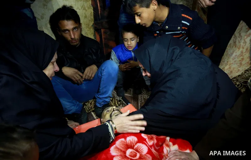 Relatives morn on the body of Palestinian Mohammed al-Aqraa, who was killed in a tunnel explosion near the Egyptian border, during his funeral in Gaza City February 9, 2017. Photo by Mohammed Asad
