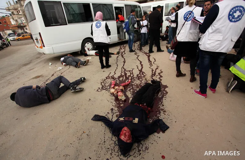 Palestinian rescue workers take part in an emergency simulation exercise, organized by the Palestinian Ministry of Health and Médecins du Monde France (Doctors of the World), in Rafah in the southern of Gaza Strip, on Fe...