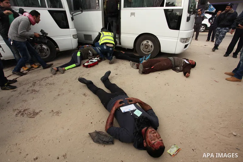 Palestinians take part in an emergency simulation exercise, organized by the Palestinian Ministry of Health and Médecins du Monde France (Doctors of the World), in Rafah in the southern of Gaza Strip, on February 9, 2017...