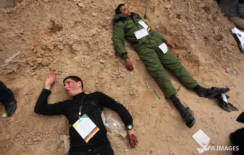 Palestinians take part in an emergency simulation exercise, organized by the Palestinian Ministry of Health and Médecins du Monde France (Doctors of the World), in Rafah in the southern of Gaza Strip, on February 9, 2017...