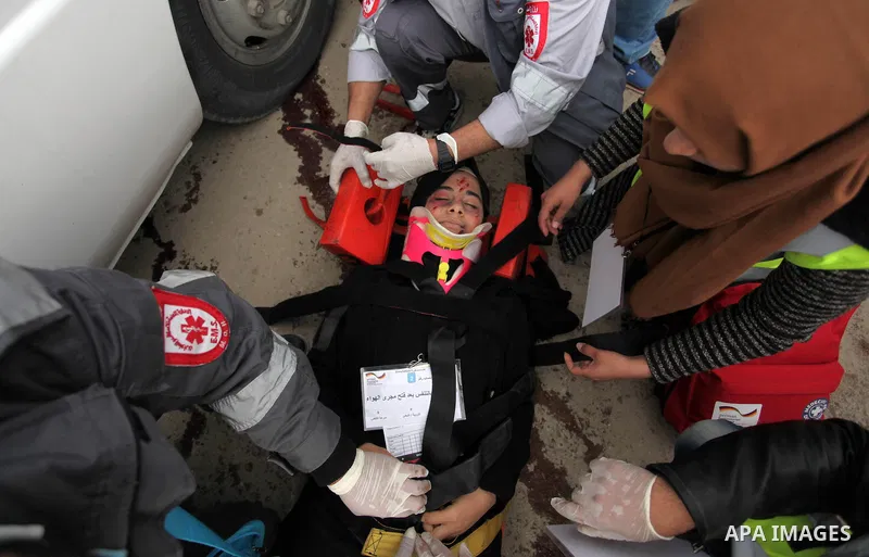 Palestinian rescue workers take part in an emergency simulation exercise, organized by the Palestinian Ministry of Health and Médecins du Monde France (Doctors of the World), in Rafah in the southern of Gaza Strip, on Fe...