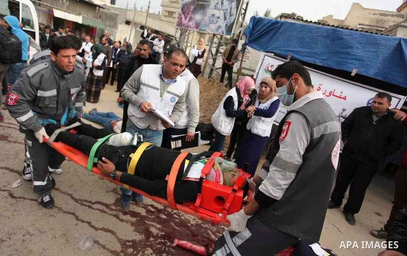 Palestinian rescue workers take part in an emergency simulation exercise, organized by the Palestinian Ministry of Health and Médecins du Monde France (Doctors of the World), in Rafah in the southern of Gaza Strip, on Fe...