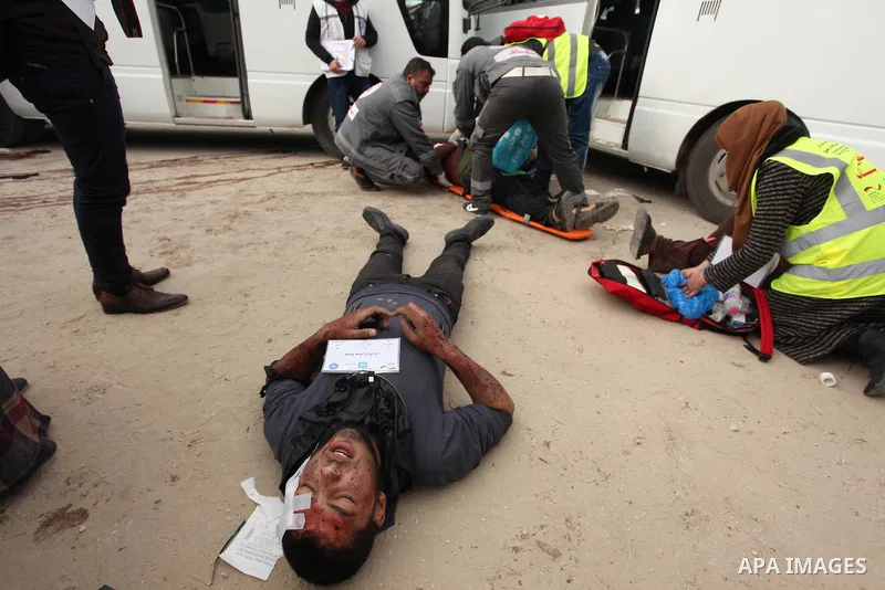 Palestinian rescue workers take part in an emergency simulation exercise, organized by the Palestinian Ministry of Health and Médecins du Monde France (Doctors of the World), in Rafah in the southern of Gaza Strip, on Fe...