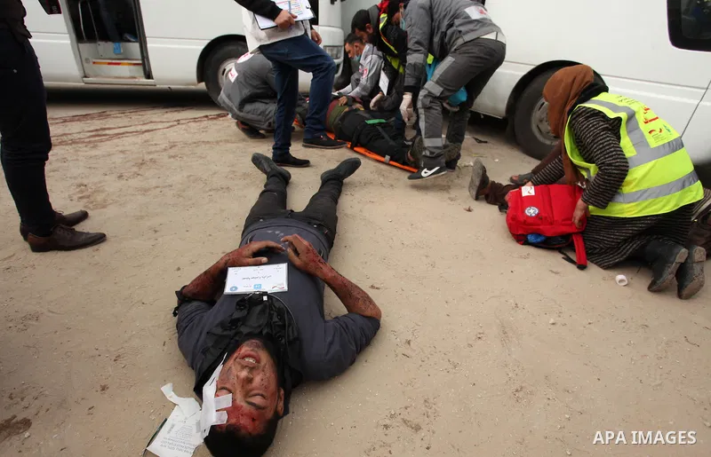 Palestinian rescue workers take part in an emergency simulation exercise, organized by the Palestinian Ministry of Health and Médecins du Monde France (Doctors of the World), in Rafah in the southern of Gaza Strip, on Fe...