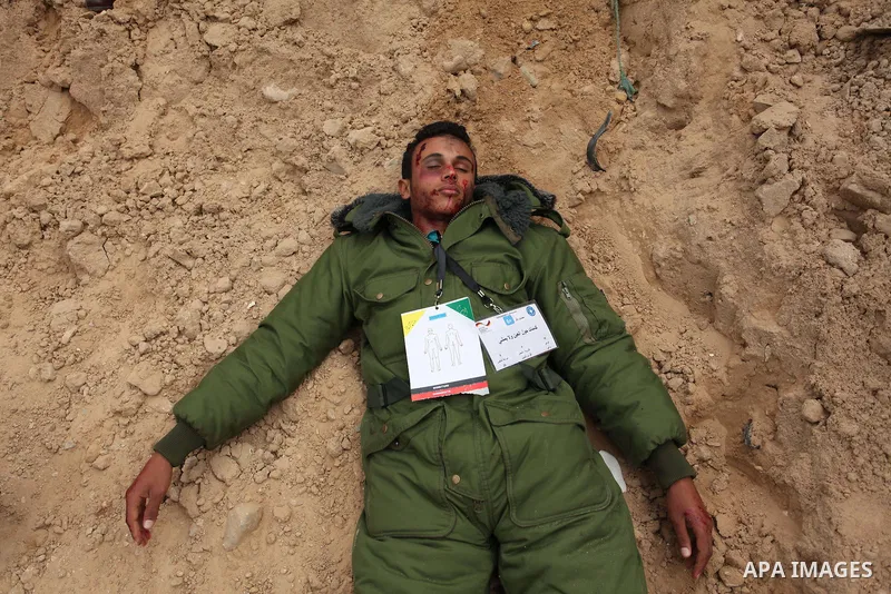 A Palestinian man takes part in an emergency simulation exercise, organized by the Palestinian Ministry of Health and Médecins du Monde France (Doctors of the World), in Rafah in the southern of Gaza Strip, on February 9...