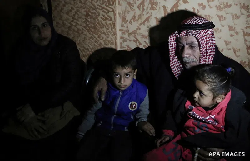 Relatives morn on the body of Palestinian Mohammed al-Aqraa, who was killed in a tunnel explosion near the Egyptian border, during his funeral in Gaza City February 9, 2017. Photo by Mohammed Dahman