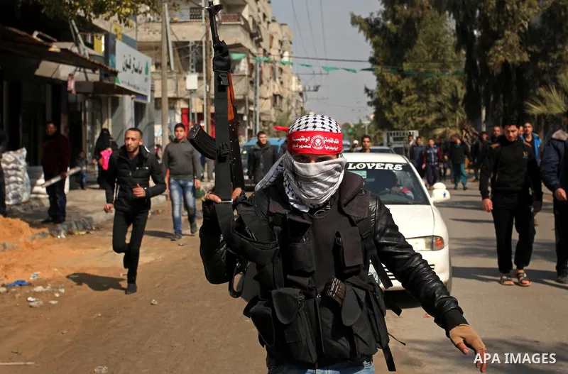 Palestinian militants attend the funeral of Palestinian Mohammed al-Aqraa, who was killed in a tunnel explosion near the Egyptian border, in Gaza City February 9, 2017. Photo by Ashraf Amra
