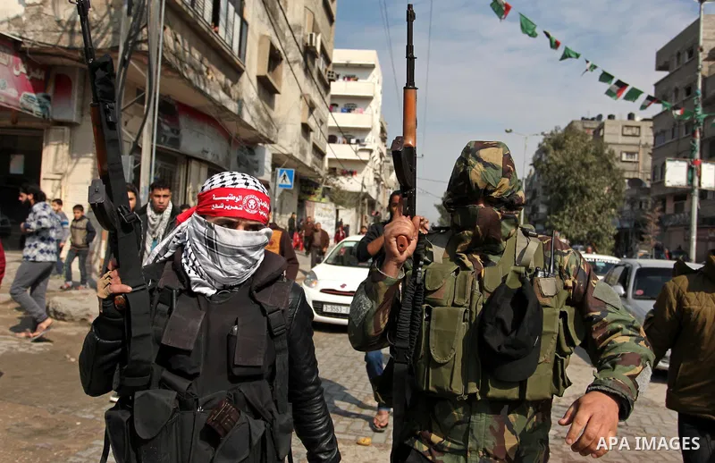 Palestinian militants attend the funeral of Palestinian Mohammed al-Aqraa, who was killed in a tunnel explosion near the Egyptian border, in Gaza City February 9, 2017. Photo by Ashraf Amra