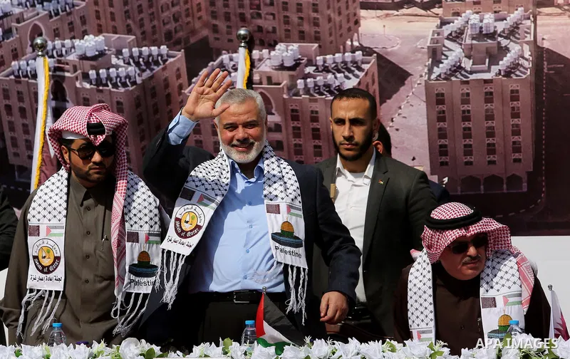 Hamas leader Ismail Haniyeh waves during the ceremony of the second phase of the Sheikh Hamad Town, in Khan Younis in the southern Gaza strip, on February 11, 2017. Photo by Ashraf Amra
