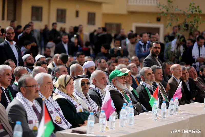 Palestinians attend the ceremony of the second phase of the Sheikh Hamad Town, in Khan Younis in the southern Gaza strip, on February 11, 2017. Photo by Ashraf Amra