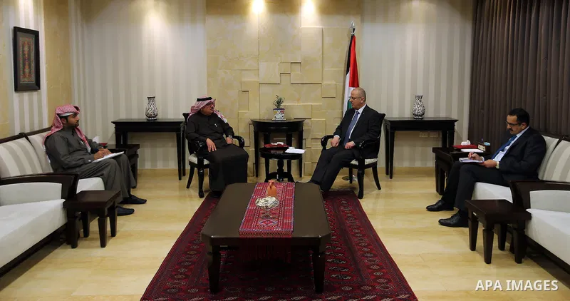 Palestinian Prime Minister Rami Hamdallah meets with Qatar's Ambassador to the Palestinian Authority, Mohammed Al Emadi, in the West Bank city of Ramallah on February 12, 2017. Photo by Prime Minister Office