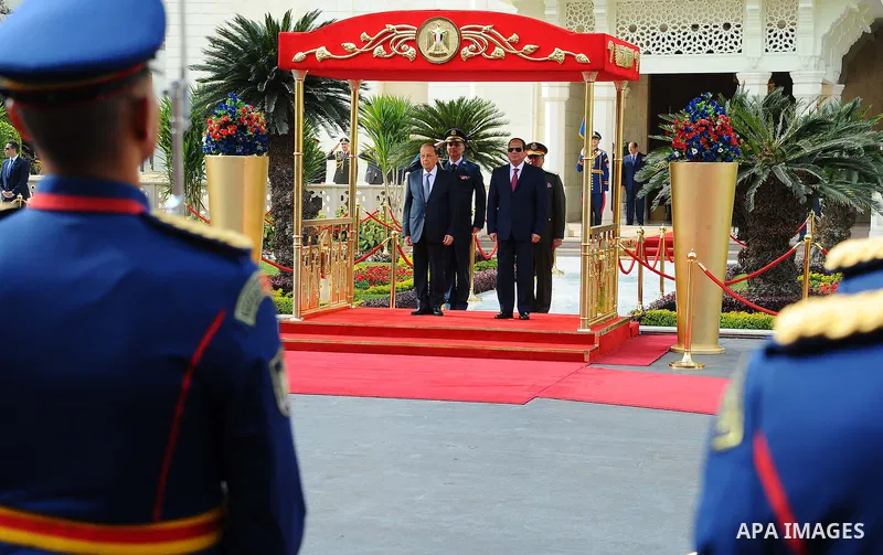 Egyptian President Abdel Fattah al-Sisi and Lebanese President Michel Aoun inspect the honor guards during the a welcome ceremony at the Presidential palace in Cairo on February 13, 2017. Aoun started his first visit to...