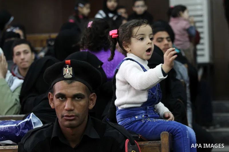 Relatives of Ansar Bait Al-Maqdis group attend their trial in Cairo on February 14, 2017, on charges of assassination of police officers, attempted assassination of interior minister Mohamed Ibrahim and explosions near s...