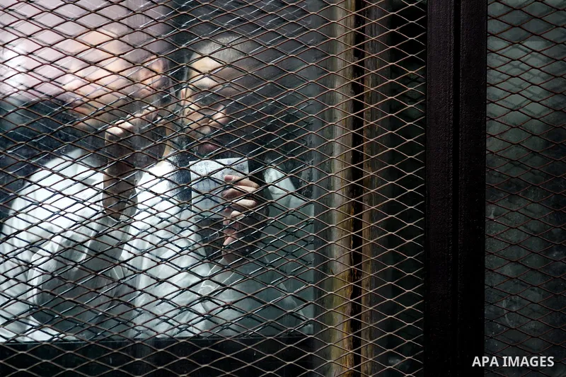 Suspects of Ansar Bait Al-Maqdis group, attend their trial in Cairo on February 14, 2017, on charges of assassination of police officers, attempted assassination of interior minister Mohamed Ibrahim and explosions near s...